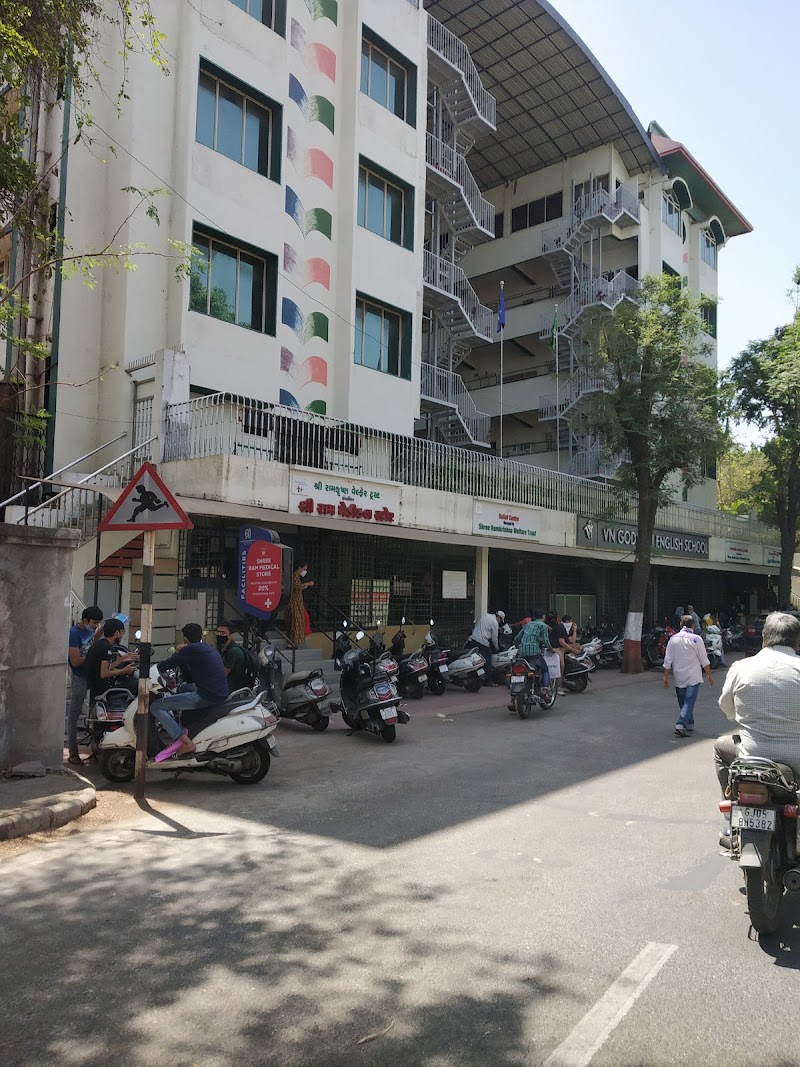 V N Godhani English School logo
